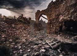 Belchite may be best described as a ghost town, located south of Zaragoza, which has served as a war memorial. The walk through the rubble in the stre